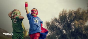 two superhero kids running marketing and branding