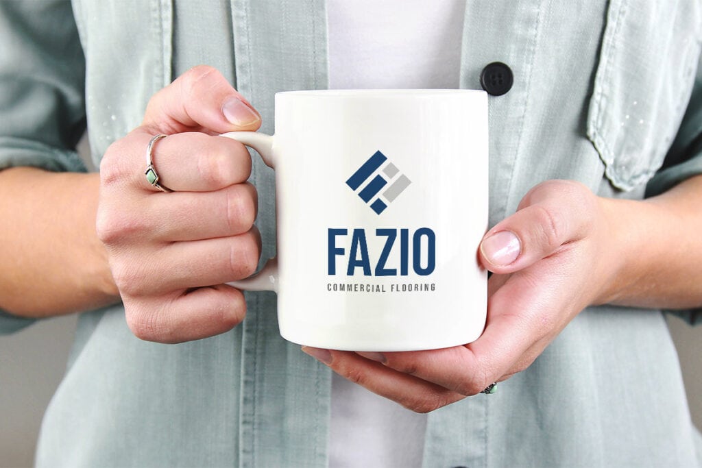 Fazio Floors new logo mockup on a mug